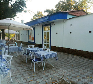 TAVERNA DIONYS на пересечении пр. Строителей и бул. Шевченко